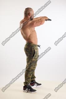 Duncan Action Pose With Guns